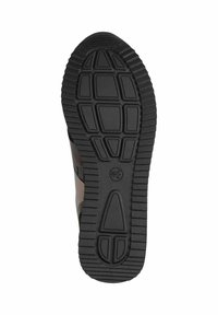 Semelle de chaussure en caoutchouc noir avec un motif texturé, présentant un épais profil pour l'adhérence et la stabilité. Pas de marque visible ni de détails supplémentaires.