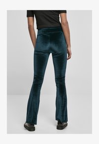 Seleccionado, teal