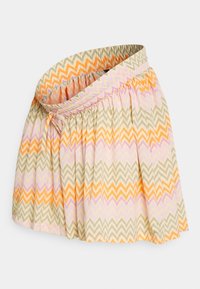 Krátká sukně se zigzagovým vzorem v oranžové, béžové a purpurové, která má nařasený elastický pas a malou boční mašli.