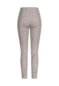 Šedé legíny s květinovým vzorem, které mají červené a bílé akcenty, hladkou texturu, vysoký pás a těsný střih.