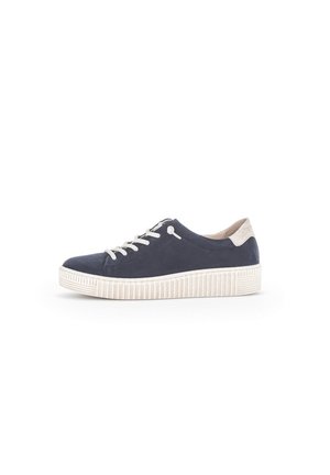 Navy blue suede sneaker with white laces, textured white rubber sole, and light beige heel accent. Rounded toe and minimalistic design.