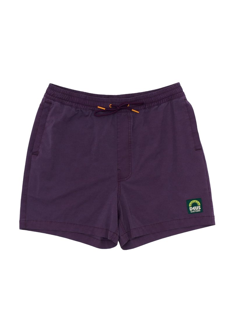 Purple swim shorts with an elastic waistband and yellow drawstring. Features two side pockets and a green logo patch on the front.