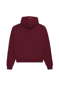 Bordowy sweatshirt z miękkiego materiału. Posiada kaptur ze sznurkiem, ściągacze na rękawach i u dołu. Na plecach znajduje się subtelne logo w górnej części środkowej.