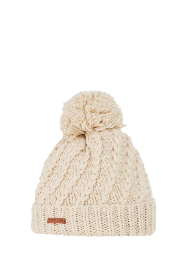 Knitted cream beanie hat with a textured cable pattern, featuring a pom-pom on top and a branded leather tag on the cuff.