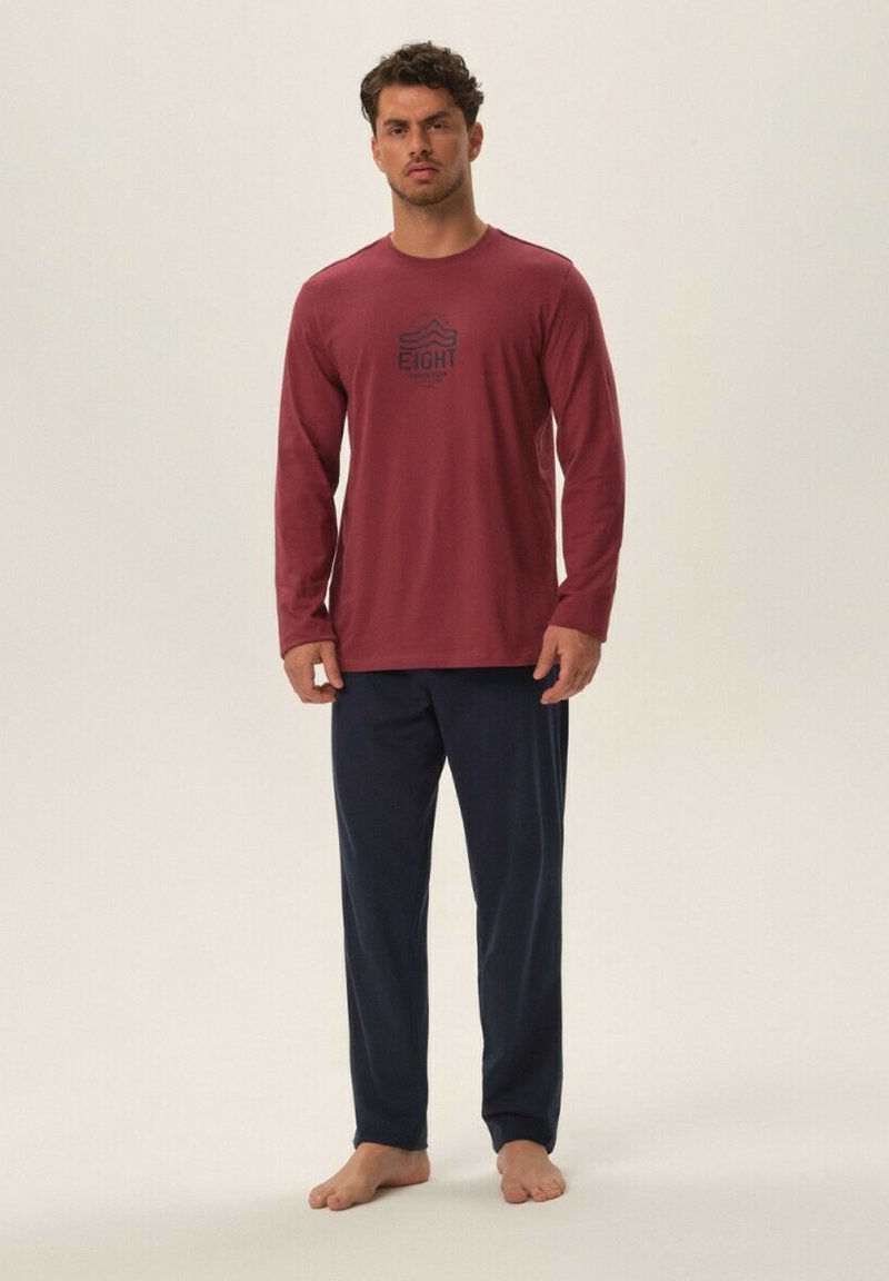 Red long-sleeve shirt with a printed "EIGHT" logo, paired with navy blue pants. Simple design, soft texture, and comfortable fit.
