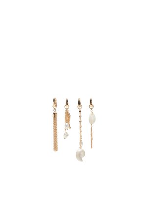 Four gold-colored hoop earrings with hanging charms including chains, pearls, and seashells on a white background.