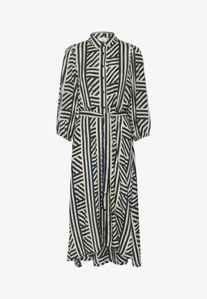 Robe longue boutonnée avec rayures verticales et diagonales noires et blanches, manches longues, col et ceinture à nouer à la taille.