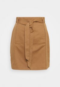 Tanfärgad mini kjol med bälte, gjord av texturerad tyg. Har sidofickor och ett knyt vid midjan, med en figurnära design och rak fåll.