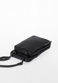 Black leather zippered pouch with a smooth texture, a sleek rectangular shape, and a detachable strap for easy carrying.