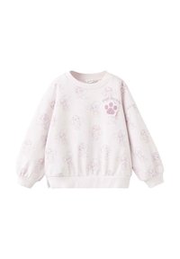 Sweat-shirt rose clair avec manches ballon et poignets côtelés, présentant un motif répétitif de chiens dessinés et un accent en forme de patte violette.
