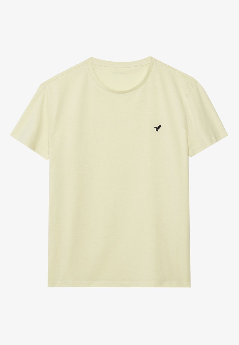 Light yellow cotton T-shirt with a round neckline and short sleeves. Features a small black bird logo on the left chest.