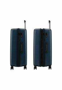Marineblauwe hard-shell koffer met dubbele ritsen, zijhandgreep, geïntegreerd combinatie-slot en vier wielen voor gemakkelijke mobiliteit.