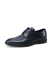 Zapato de vestir de piel azul oscuro con textura suave, punta redonda y diseño de cordones. Cuenta con una suela de goma negra resistente y costuras mínimas.