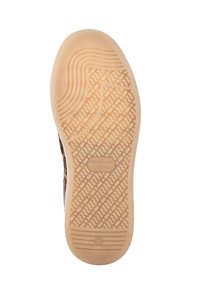 Rubber outsole with a textured pattern, featuring a cream-colored base and light brown accents. Marked “MADE IN ITALY” and size “37.”