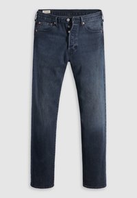 Dunkelblaue Denim-Jeans mit geradem Bein design, ausgestattet mit einem Knopfverschluss, fünf Taschen und kupferfarbenen Nieten. Glatte Textur mit minimaler Ausbleichung.