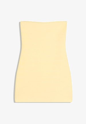 Rochie mini bej fără bretele, cu o siluetă conică, tip clepsidră, și detalii subtile de cusături orizontale.