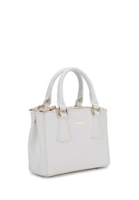 Piccola borsa bianca realizzata in materiale testurizzato, con doppi manici superiori, zip dorata e logo in rilievo sul pannello anteriore.