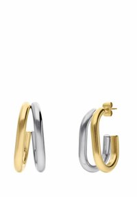 Gouden en zilveren creolen met een slank, gebogen ontwerp met een gepolijste afwerking en een bevestiging met een post. Elke oorknop heeft een unieke vorm.