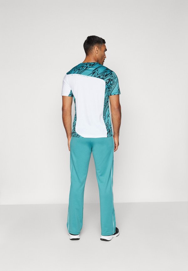 TRAVEN TRACK PANTS - Tracksuit bottoms - teal3