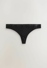 Svart stringtrosa med en slät tygfinish. Har en bred midja med ordet "NEXT" präglat. Enkel och minimalistisk design.