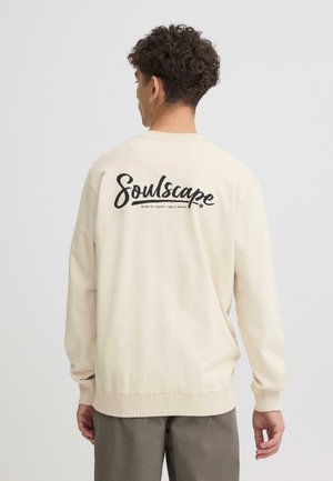 Beiges Sweatshirt mit Rundhalsausschnitt und langen Ärmeln, mit großem schwarzem "Soulscape"-Grafikdruck auf der Rückseite und gerippten Bündchen. Baumwollmischgewebe.