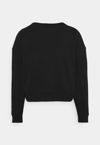 Sweatshirt noir à manches longues avec encolure ronde, poignets et ourlet côtelés, vu de dos sur un fond gris clair uni.