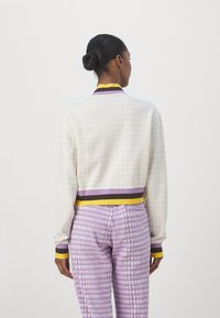 Puma LEMLEM JACKET - Užtrauktuku užsegamas treningas - warm white