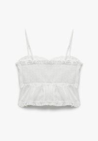 Top bianco corto con spalline sottili, caratterizzato da un tessuto testurizzato, bordi arricciati e un design frontale arricciato. Il materiale è leggero e arioso.