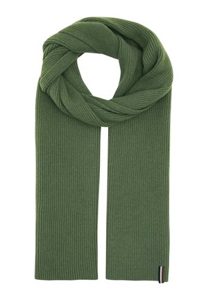 Green ribbed knit scarf folded in a loop with a small black, white, and red striped tag on one end.