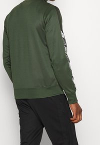 Nike Sportswear Bluzka z długim rękawem