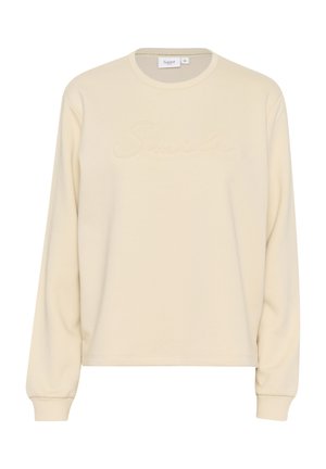 Cremefarvet sweatshirt med lange ærmer, der har en diskret "Smile" brodering på forsiden. Lavet af blødt stof med en afslappet pasform.