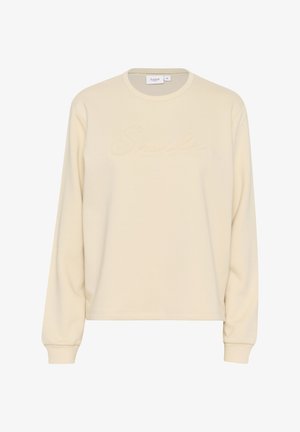 Kremowy sweatshirt z długimi rękawami, z subtelnym haftem "Smile" z przodu. Wykonany z miękkiego materiału o luźnym kroju.