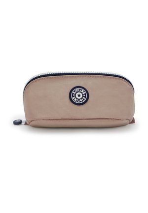 Beige fabric pencil case with a rounded shape, zip closure, and a navy circular logo patch featuring a star. Smooth texture with a subtle sheen.
