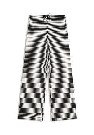 Pantalon à jambes larges à rayures horizontales noires et blanches avec une ceinture élastique et un cordon de serrage à l'avant.