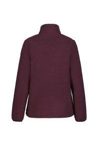 Bordeaux fleece jack met een hoge kraag, gestructureerd oppervlak en lange mouwen. Geen zichtbare sluitingen; casual ontwerp dat geschikt is voor lagen.