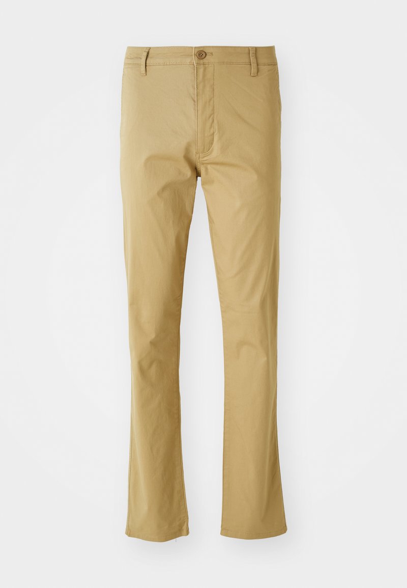 Pantalons légers beiges en coton avec une coupe droite, présentant une fermeture à bouton sur le devant et une texture subtile. Pas de motifs ni d'accents.