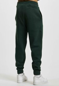 DEF Donji dijelovi trenirke - dark green