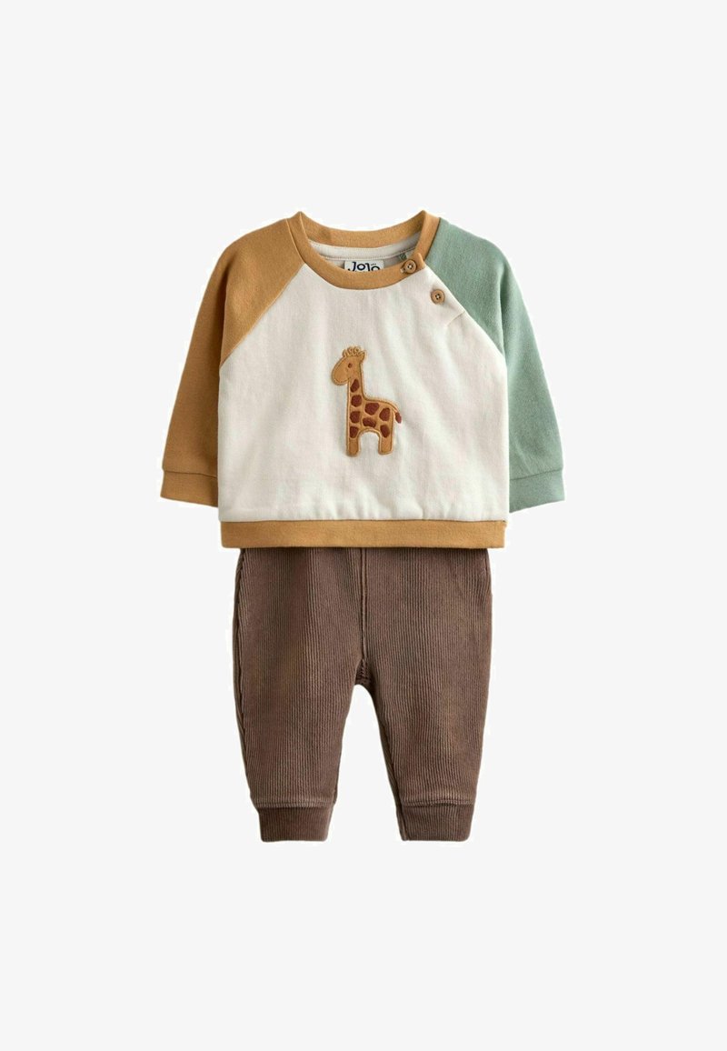 To-delt børnetøj bestående af en hvid og brun langærmet top med girafdesign og brune fløjlsbukser.