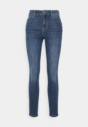 Mörkblå skinny jeans i denim. Högmidjad design med en slät yta, med framfickor och metallknappstängning.