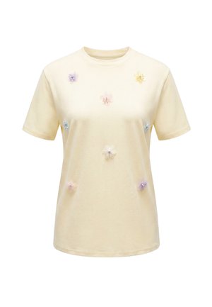 Lysgul kortærmet t-shirt dekoreret med små pastelfarvede stofblomster fordelt på forsiden.