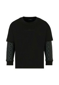 T-shirt noir à manches courtes, avec un design de manches gris foncé texturé et du texte répété. Marquage subtil au niveau de la poitrine.