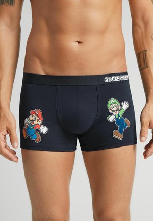 Marineblaue Boxershorts aus dehnbarem Material mit großen Druckgrafiken von Mario und Luigi an den Seiten, versehen mit einem kontrastierenden Bund.