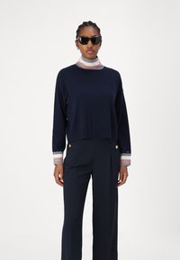 Tommy Hilfiger Püksid - desert sky