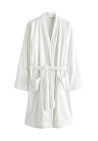Weißer Bademantel aus Frottee mit langen Ärmeln, Taillengürtel und zwei Fronttaschen. Weicher Stoff mit einem einfachen, minimalistischen Design.