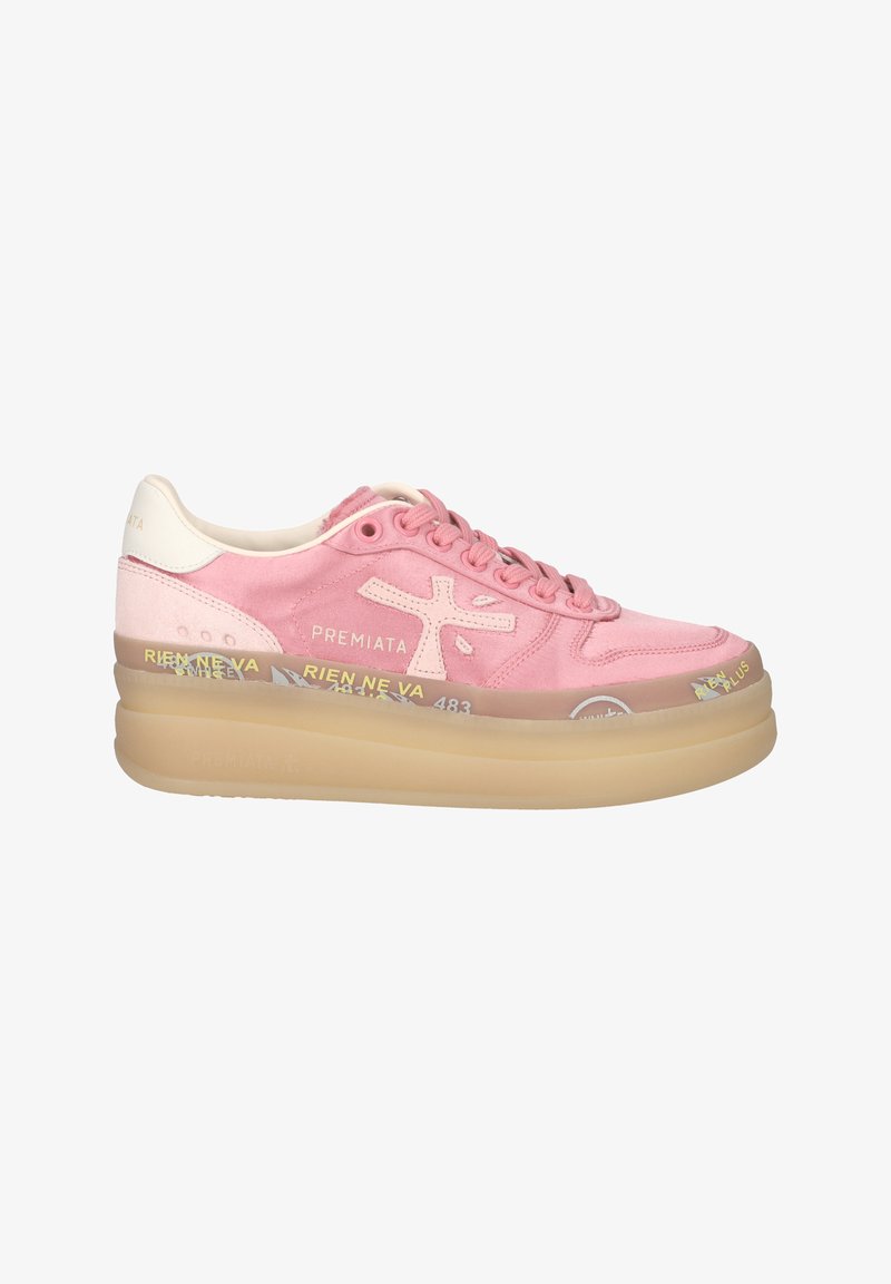 Pink suede sneaker with cream accents, thick translucent sole, front lacing, and printed text on the side and sole. Brand logo visible.