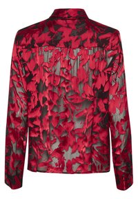 Rode bloempatronde doorschijnende blouse met lange mouwen, donker stofaccenten en kraagdetails. Heeft een lichte, gladde textuur en knoopmanchetten.