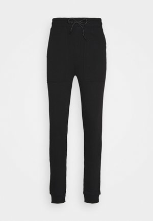 JOGGER LABEL UNISEX - Tracksuit bottoms - black