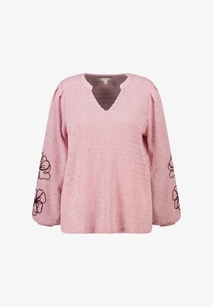 Roze gestructureerde blouse met lange mouwen, V-hals en zwarte bloemrijke borduursels op de mouwen, maat medium.