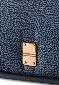 Navy patterned fabric bag featuring a textured design and a gold-toned clasp with the brand name "BORBONESE" engraved.