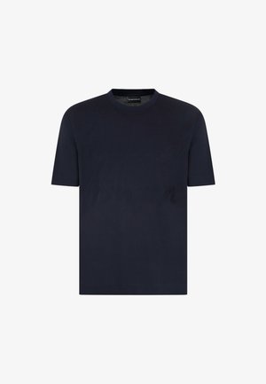 T-shirt a maniche corte di colore blu navy realizzato in cotone, con collo a giro e orlo dritto, texture liscia senza motivi o dettagli visibili.